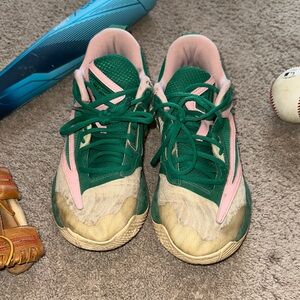 Nike Green and Pink Giannis sneakers.